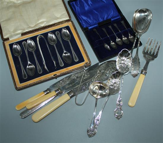 6 pairs of plated fish eaters and pair of matching servers. 4 silver coffee spoons and misc plated items